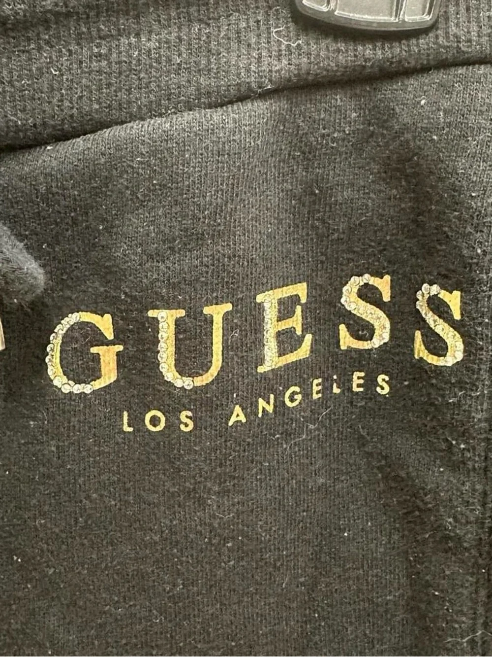 GUESS black and gold with rhinestones sweat pants.